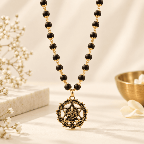 Gold-plated Karungali Mala with Hanuman Kavach pendant made from natural black ebony beads