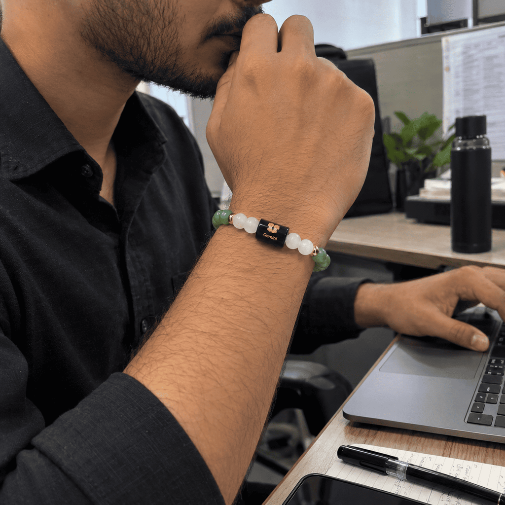 Gemini bracelet with Green Aventurine and Milky Quartz worn by a man working at an office desk | DivyaZone