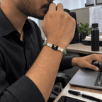 Gemini bracelet with Green Aventurine and Milky Quartz worn by a man working at an office desk | DivyaZone