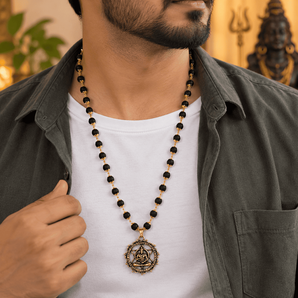 Gold-plated Karungali Mala with Hanuman Kavach showing product features, natural ebony beads and craftsmanship