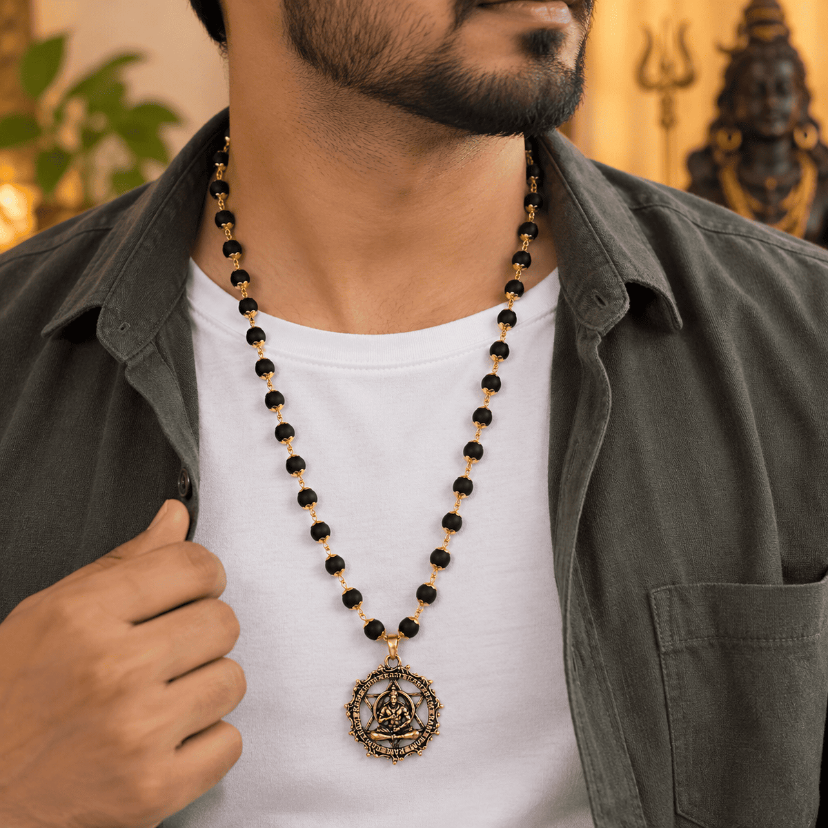Gold-plated Karungali Mala with Hanuman Kavach showing product features, natural ebony beads and craftsmanship