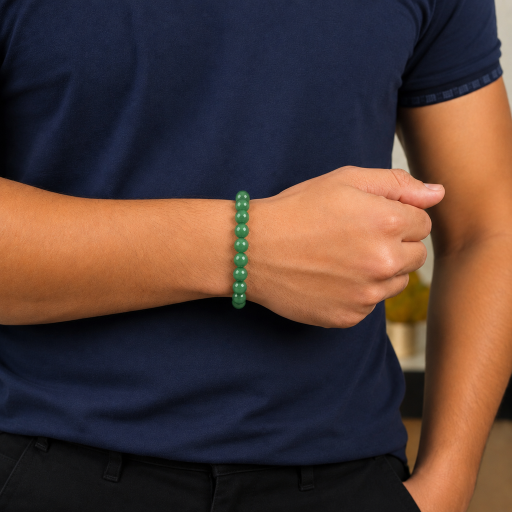 Man wearing a natural Green Aventurine crystal bracelet by DIVYAZONE