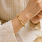 Natural Citrine crystal bracelet worn on wrist, unisex design for men and women