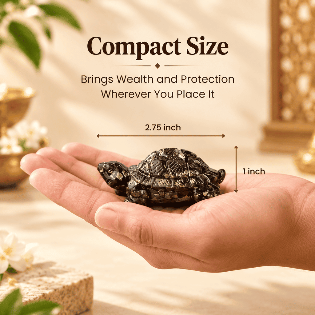 Pyrite Tortoise held in a hand showing its compact 2.75 inch length and 1 inch height