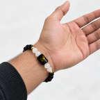 Scorpio Black Obsidian and Milky Quartz bracelet worn on hand with 8mm crystal beads