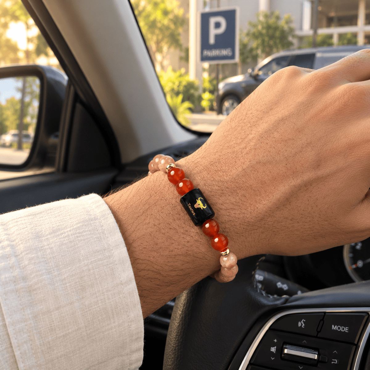 Taurus zodiac bracelet with Sunstone and Carnelian worn by a man for everyday and office wear | DivyaZone